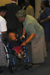 First Lady Helps Recipient